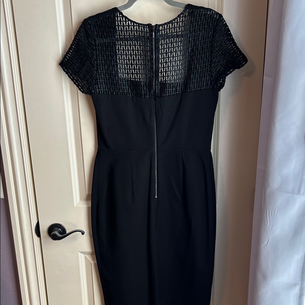 Banana Republic Black Midi Dress with Textured Sleeves
#0029 - Picture 2 of 5